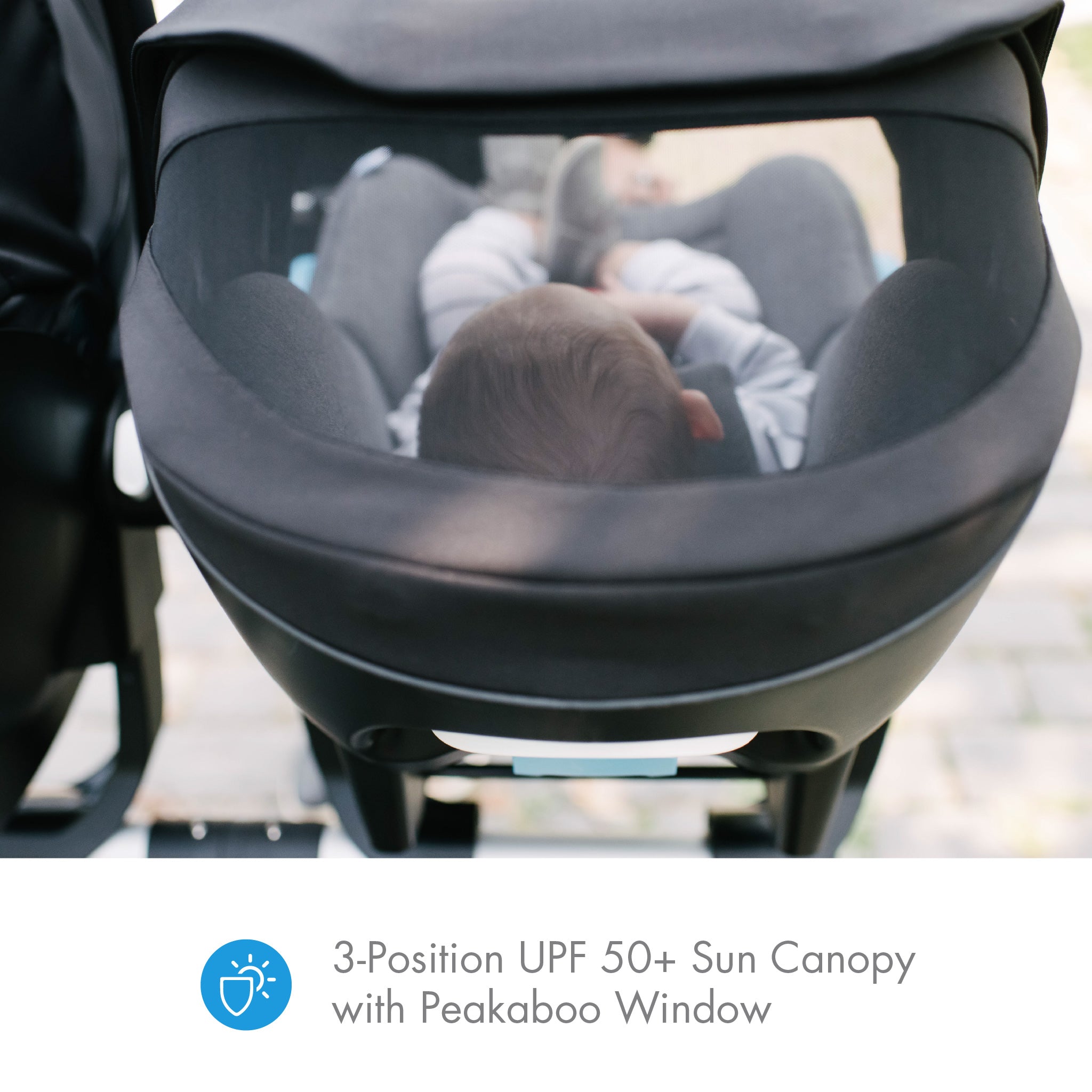 Baby in a Clek Liing on a stroller with a 3-position UPF 50+ sun canopy and peakaboo window. all-groups