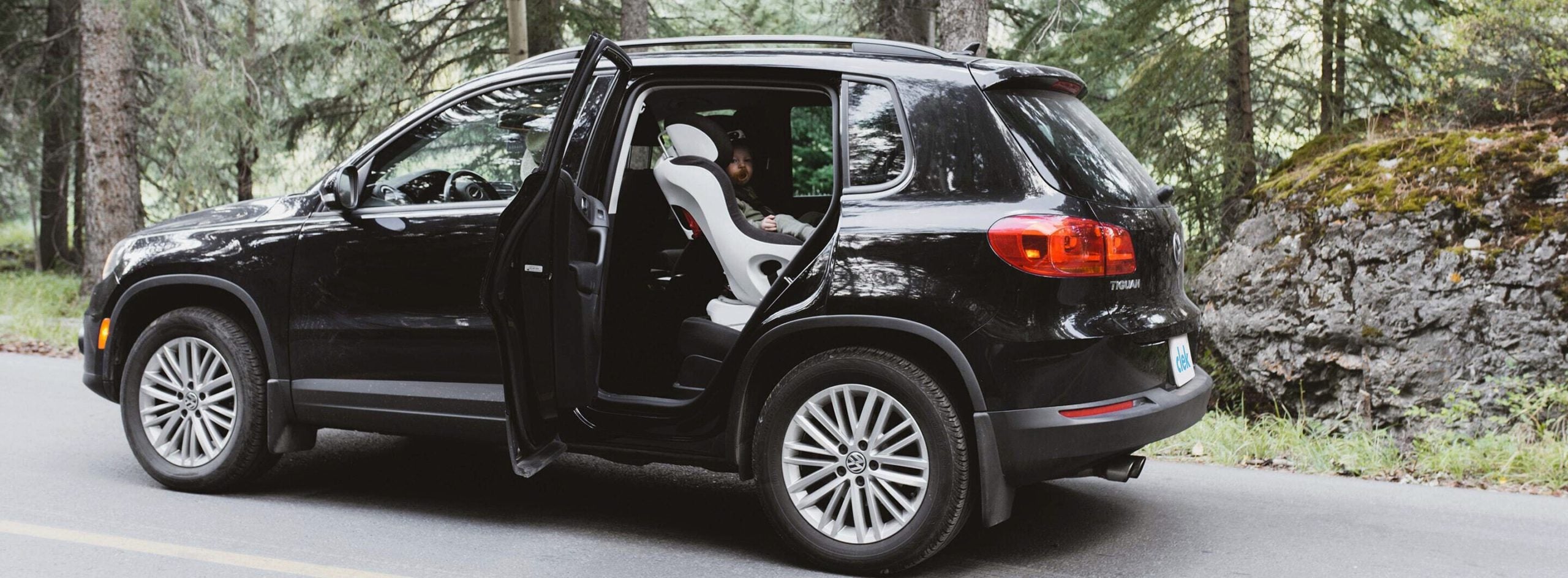 Clek Foonf convertible car seat installed in rear-facing mode in a Volkswagen SUV
