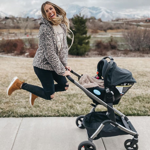 Clek Liing on a Colugo Complete Stroller