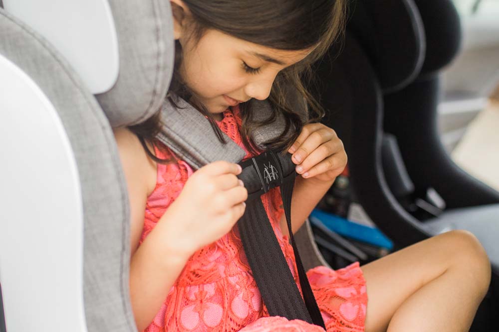 Booster seat clearance seat belt clip