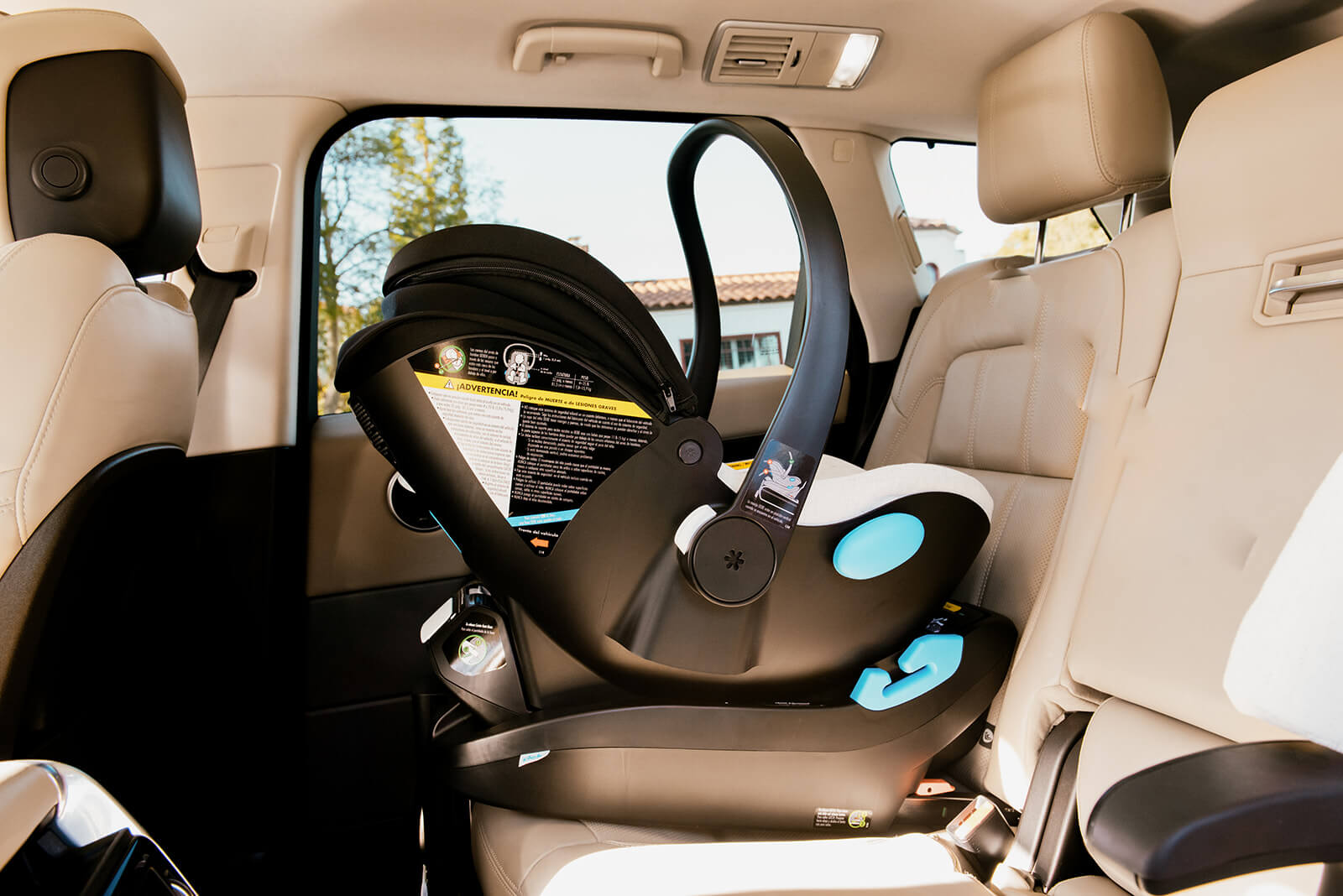 clek liing infant car seat in a range rover