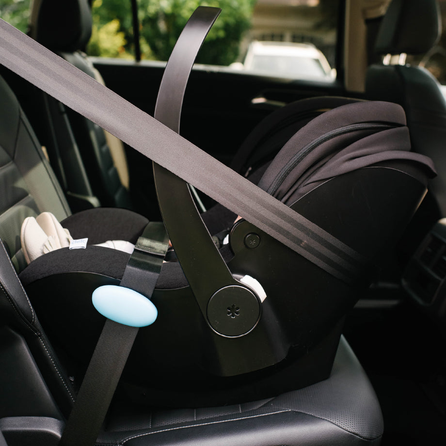 Clek Liingo infant car seat installed using the Euro Belt Path method