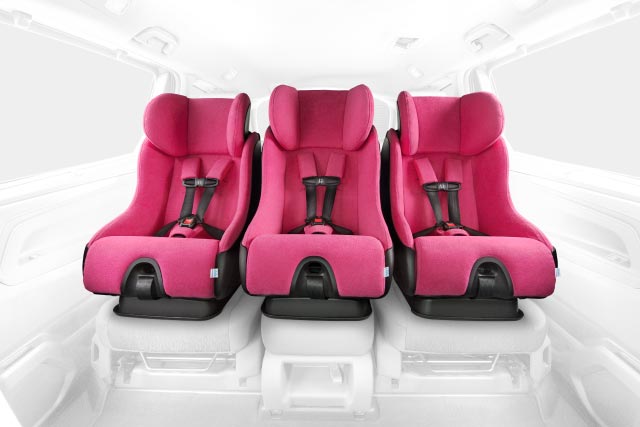Clek Fllo convertible car seats installed in 3-across position in an SUV